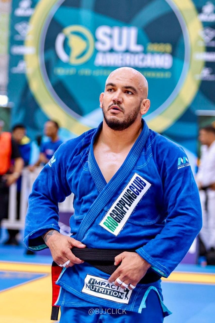 Romes Ramos Jr. wearing a blue Rio Grappling Club gi at a jiu-jitsu event