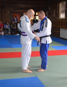 Vieku receiving his belt.